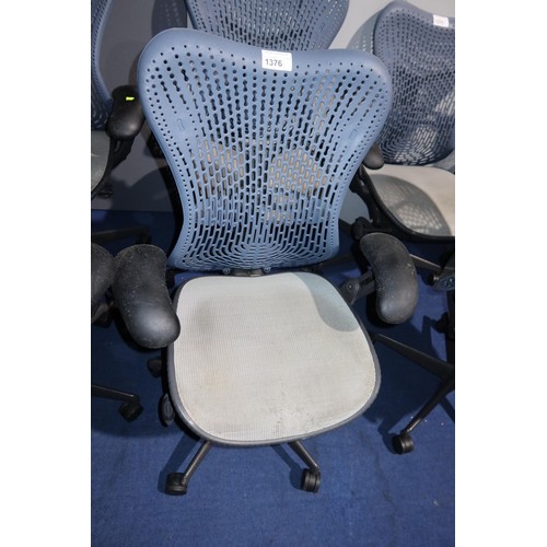 1376 - 1 x Herman Miller Mirra office swivel chair with grey mesh seat and dark blue plastic back