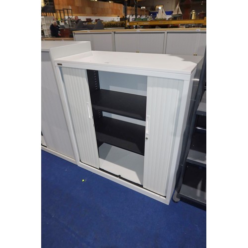 1292 - 1 x Triumph white metal tambour front cabinet approx 100 x 47 x 110cm high