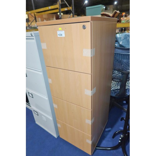 1330 - 1 x wood effect four drawer filing cabinet - Appears to be unused (handles are inside and require fi... 