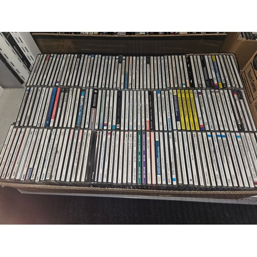 2630 - A quantity of various items including CDs & books etc. Contents of 3 shelves