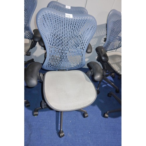 1374 - 1 x Herman Miller Mirra office swivel chair with grey mesh seat and dark blue plastic back