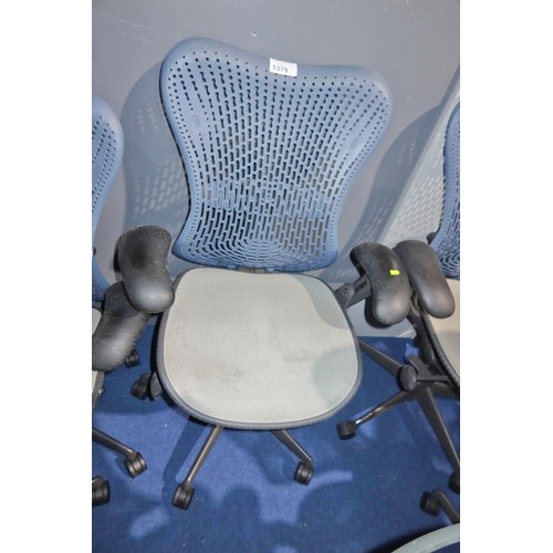 1379 - 1 x Herman Miller Mirra office swivel chair with grey mesh seat and dark blue plastic back