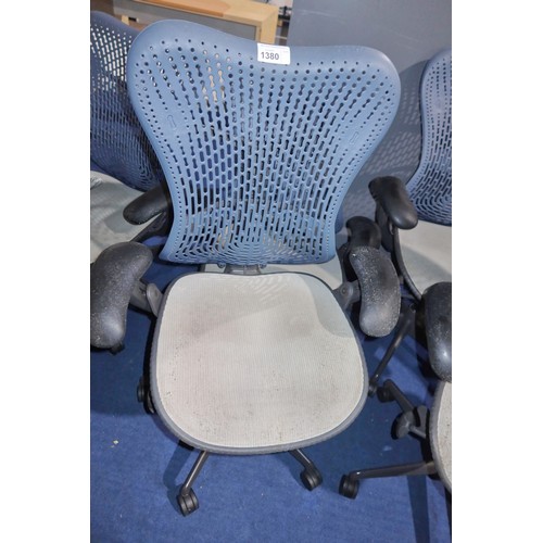 1380 - 2 x Herman Miller Mirra office swivel chairs with grey mesh seat and dark blue plastic back. Please ... 