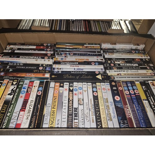 2638 - A large quantity of various DVDs and CDs, contents of 3 shelves