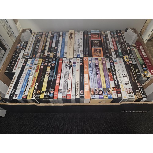 2639 - A large quantity of various DVDs and CDs, contents of 4 shelves