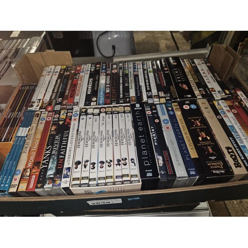 2639 - A large quantity of various DVDs and CDs, contents of 4 shelves