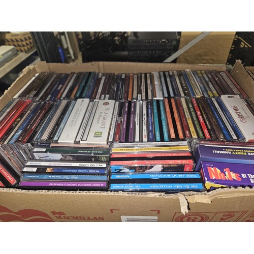 2640 - A large quantity of various DVDs and CDs, contents of 4 shelves