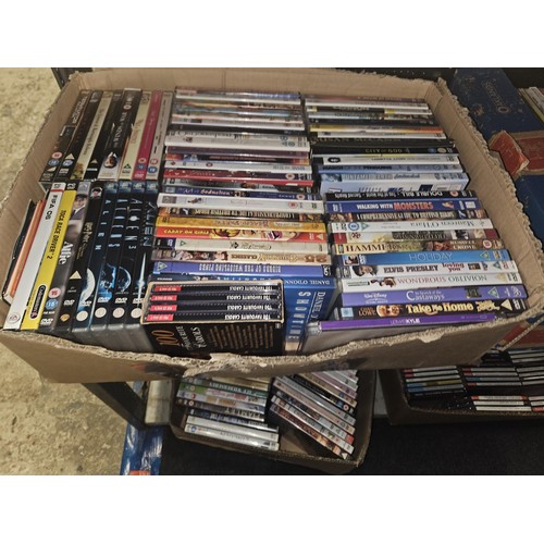 2640 - A large quantity of various DVDs and CDs, contents of 4 shelves