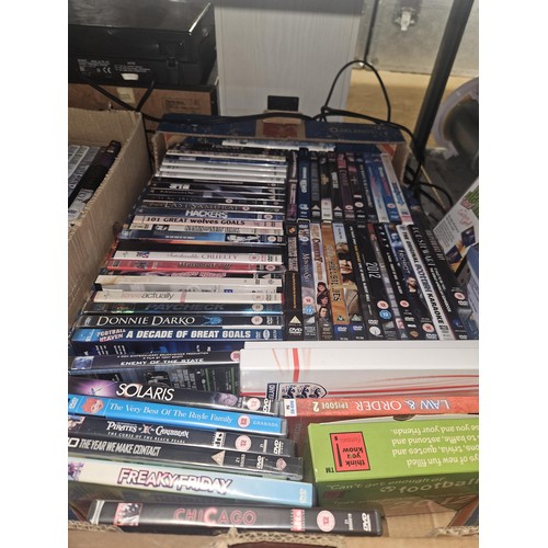 2641 - A large quantity of various DVDs and CDs, contents of 3 shelves