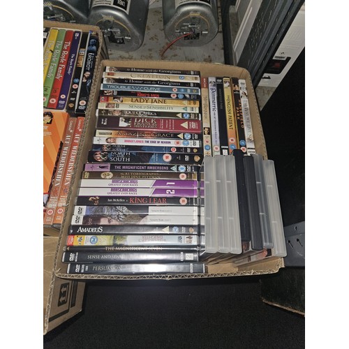 2642 - A large quantity of various DVDs and CDs, contents of 3 shelves