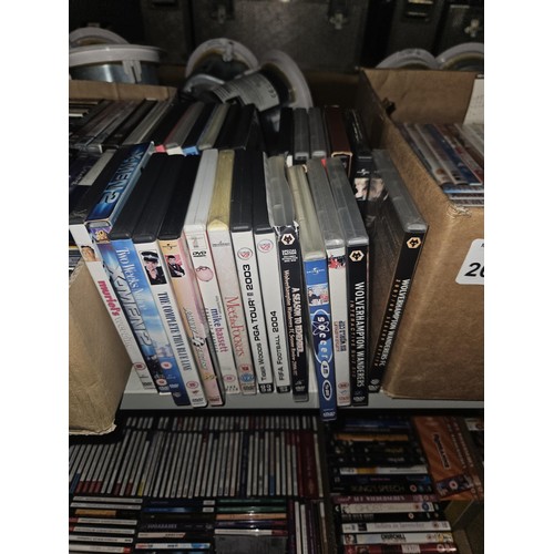 2642 - A large quantity of various DVDs and CDs, contents of 3 shelves