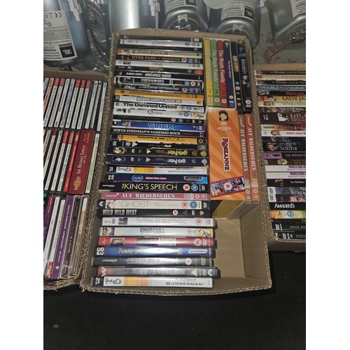 2642 - A large quantity of various DVDs and CDs, contents of 3 shelves