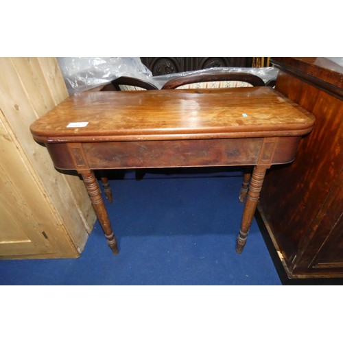 3359 - A 19th Century mahogany rectangular topped fold over tea table on turned legs