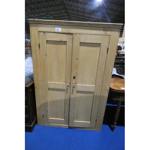 3360 - A vintage pine floor standing cabinet with two panelled doors, approximately 107 cm wide