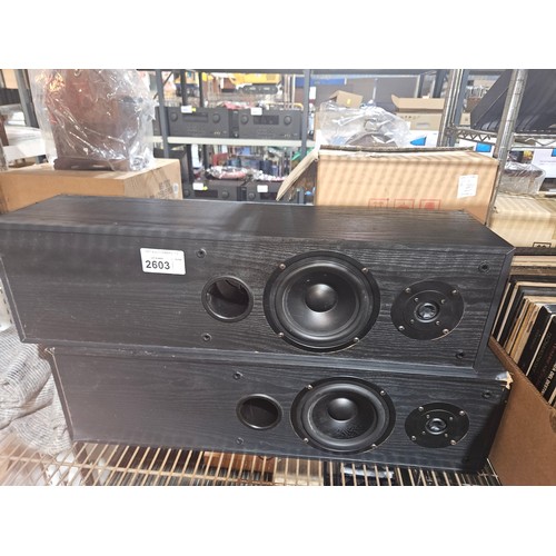 2603 - A pair of tall acoustic solutions speakers and a quantity of various vinyl records