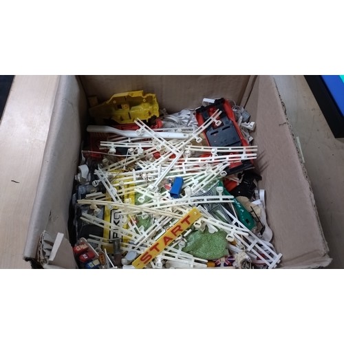 2781 - A quantity of various scalextric, cars, track, buildings, barriers etc, contents of 4 boxes