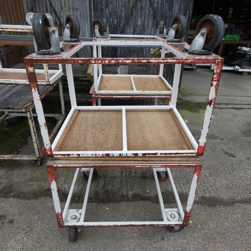 6321 - 2 x wheeled bench trolleys with a metal frame, each approx 93cm L x 71cm W x 79cm H