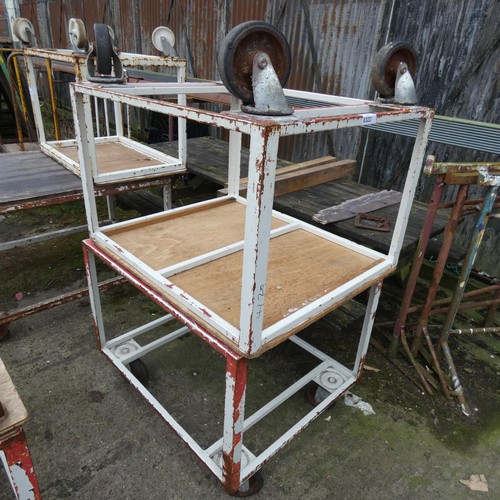 6322 - 2 x wheeled bench trolleys with a metal frame, each approx 93cm L x 71cm W x 79cm H