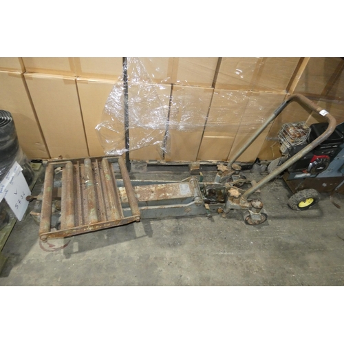 5521 - 1 x manual hydraulic trolley jack capacity approx 2200lbs (cannot read the make)