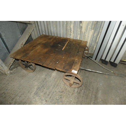 5561 - 1 x vintage trolley with cast metal wheels and a wooden flat bed (approx 107 x 85cm)