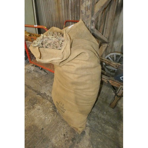 5549 - 1 x hessian sack containing an ex-MOD camouflage netting sheet