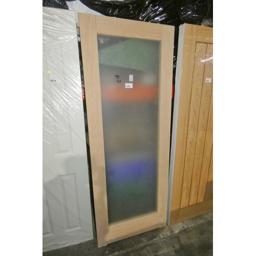 5580 - 1 x glazed wood effect door approx 1981 x 762mm