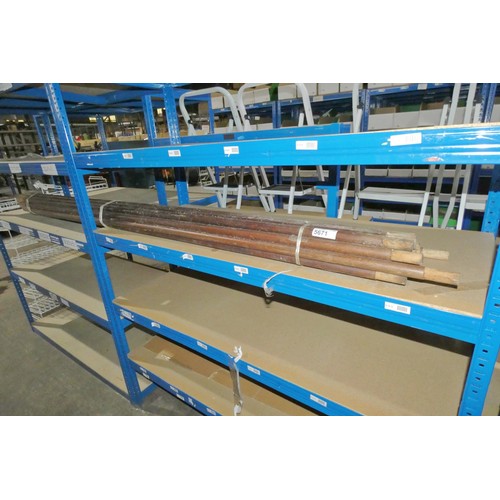 5671 - A quantity of wooden handles each approx 240cm long