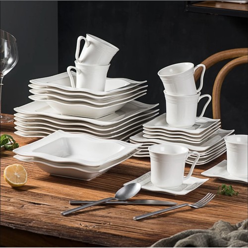 148 - An Aakif 60 piece dinnerware set for 12 people RRP £165