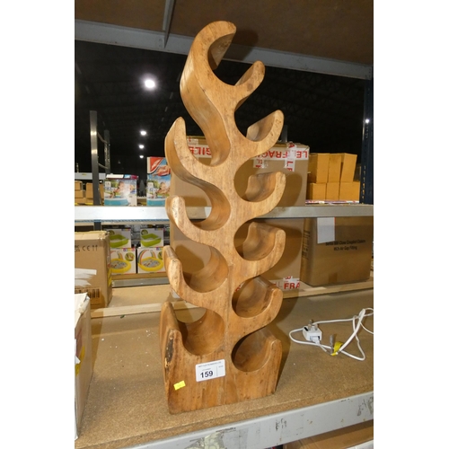 159 - An abstract solid wood wine bottle rack for 10 bottles.
THIS WINE RACK HAS BEEN REPAIRED