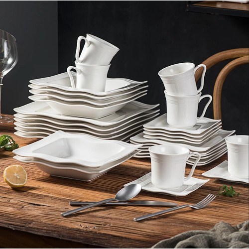 207 - An Aakif 60 piece dinnerware set for 12 people RRP £165