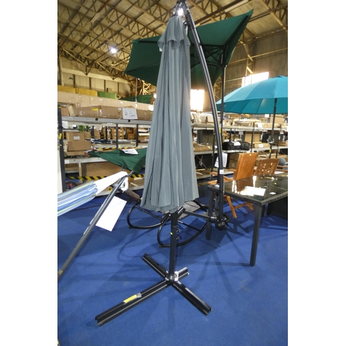 595 - 1 x Roxana 3m wind out cantilever parasol. Please note that no base weights are included