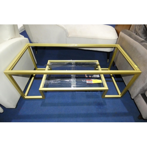 610 - 1 x metal framed coffee table with shelf beneath approx 115 x 51cm. Please note that this coffee tab... 