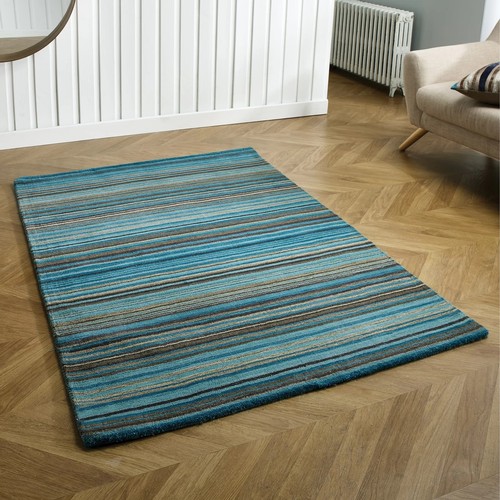 520 - 1 x Carter Teal rug approx 120 x 170cm