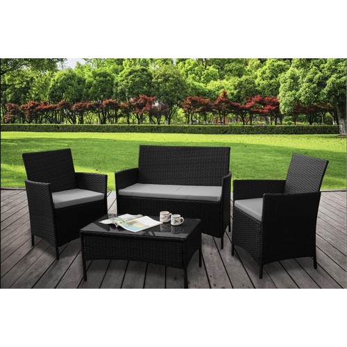 602 - A Schmier 4 person polyrattan outdoor seating group with cushions comprising 2 x chairs, 1 x sofa an... 