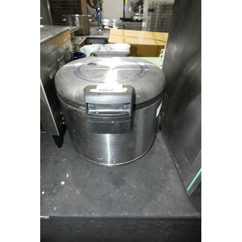 1062 - A commercial stainless steel rice cooker by Hallco - trade