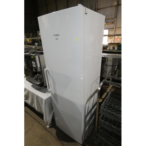 1153 - A tall white fridge by Bosch no model visible - trade. Tested Working