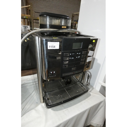 1154 - A commercial stainless steel bean to cup coffee machine by Faema type x2-Grand Italia, has been serv... 