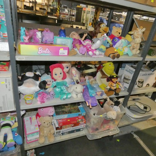 2329 - A quantity of various toys inc puzzles, Shrek, Barbie etc, contents of 3 shelves