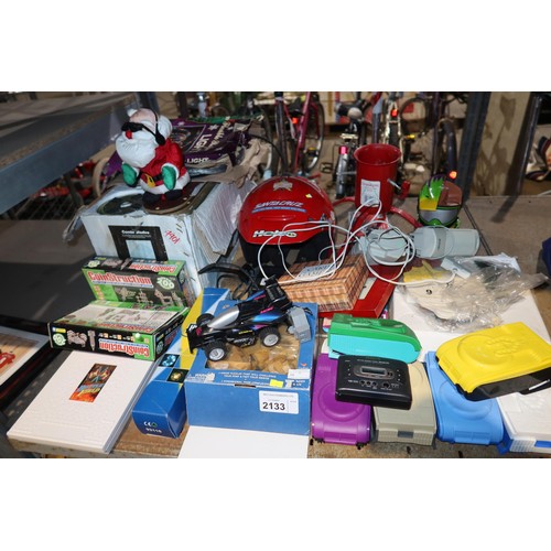 2133 - A quantity of various household items including games, a pair of 240v powered speakers, a ceiling fa... 