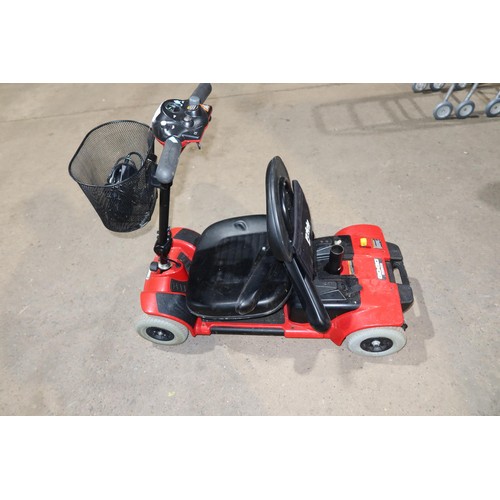 2121 - 1 x Go Go battery powered mobility scooter supplied with a key and a mains battery charger. Please n... 