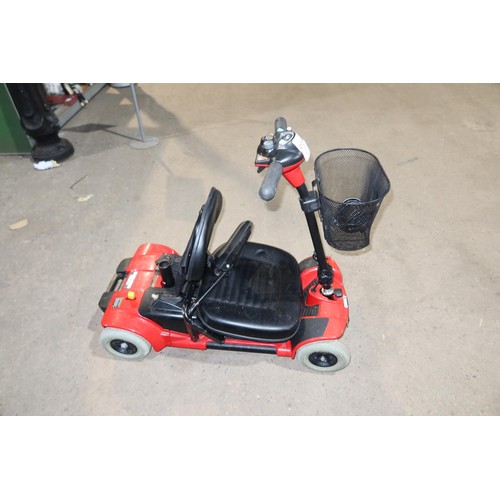 2121 - 1 x Go Go battery powered mobility scooter supplied with a key and a mains battery charger. Please n... 