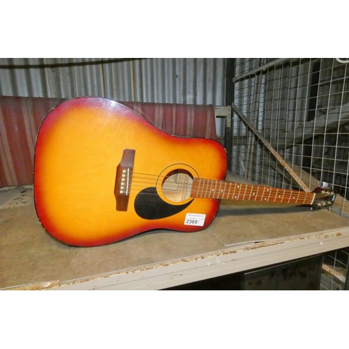 2369 - An acoustic guitar by Tanglewood type Tw-300, no case