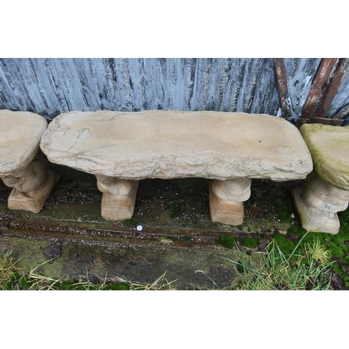 2539 - A wood effect concrete bench on 2 squirrel plinths