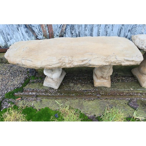 2540 - A wood effect concrete bench on 2 squirrel plinths