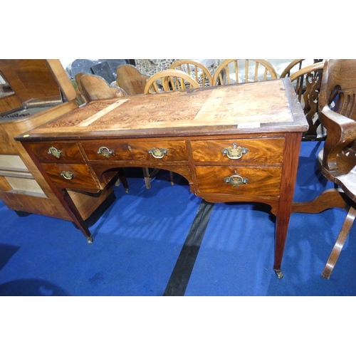 3383 - A Mahogany knee-hole writing table with five small drawers, approximately 120 cm wide