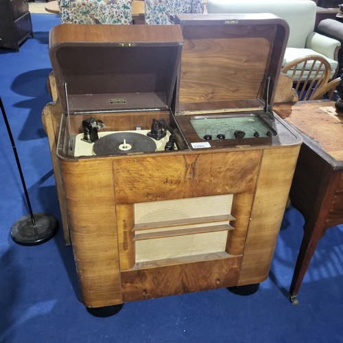 3385 - A vintage walnut cased Dynatron Radiogram Model "Ether Conqueror", Type K129 s/n 364. with two lift ...