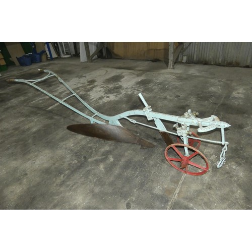 88 - A vintage horse drawn single furrow plough by R Hornsby & Sons Ltd