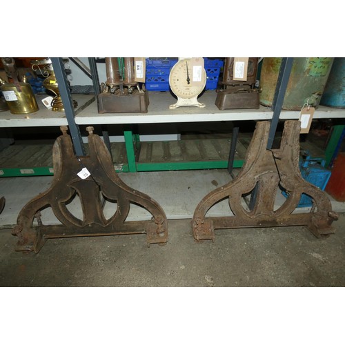 75 - 2 x similar cast iron legs/stands, 1 by W Huxtable & Sons, Honiton and 1 by W Mickelburgh, Honiton