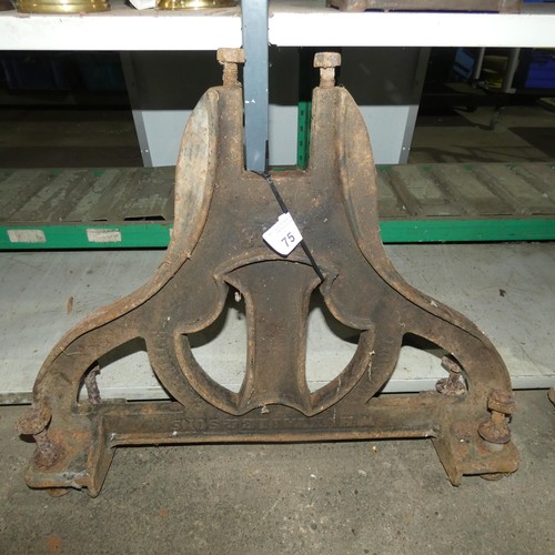 75 - 2 x similar cast iron legs/stands, 1 by W Huxtable & Sons, Honiton and 1 by W Mickelburgh, Honiton