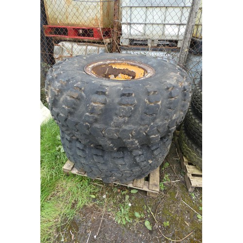 110 - A pair of wheels and tyres, removed from a dung spreader, no size visible